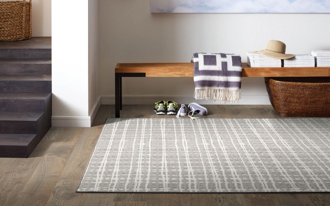 How to Keep a Rug in Place on Wood Floors: 4 Ways That Really Work